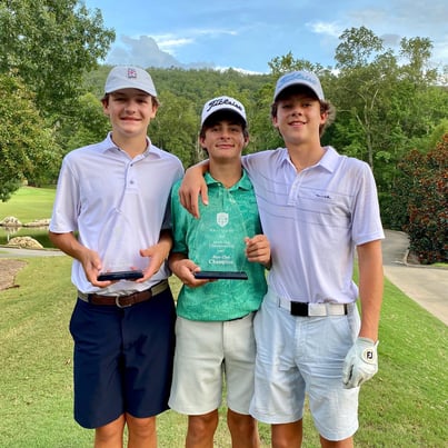 Chase Kyes with golfing award and young golfers – Greystone