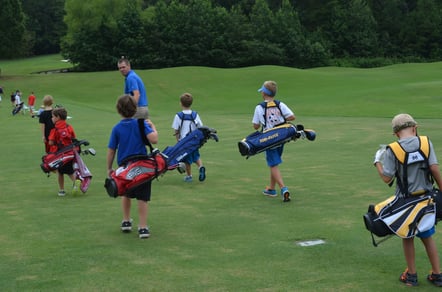 kids golfing at greystone golf and country club